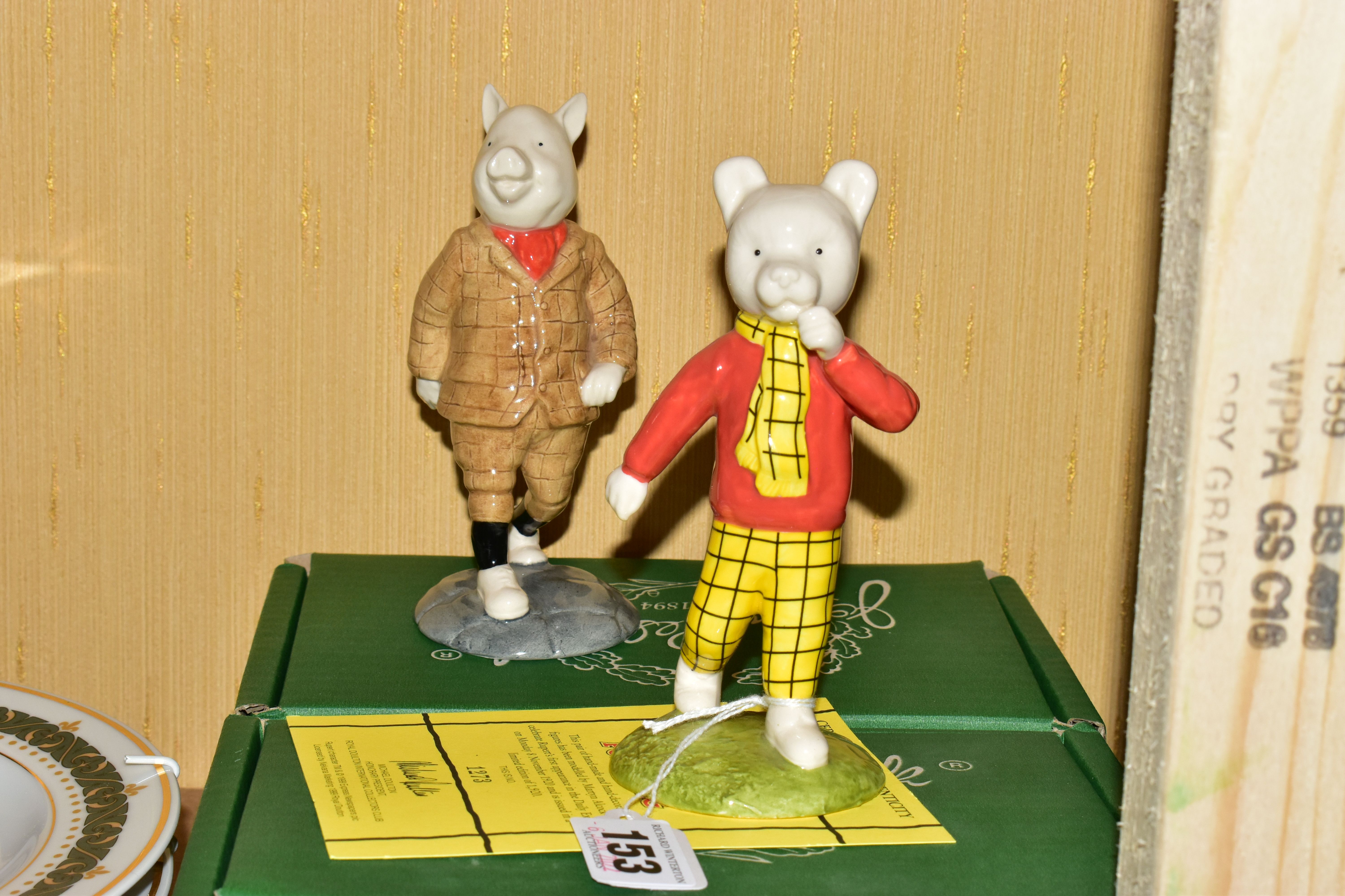 A PAIR OF BOXED ROYAL DOULTON BESWICK LIMITED EDITION RUPERT THE BEAR FIGURES, celebrating Ruperts