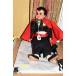 AN UNMARKED COMPOSITION DOLL DRESSED AS A MATADOR, moulded and painted features and hair, jointed