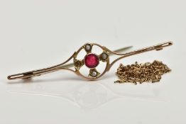 A BAR BROOCH AND A CHAIN, the rose gold bar brooch featuring a circular cut red paste in a