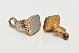 TWO CARVED INTAGLIO FOBS, both designed with rectangular chalcedony panels, the first with