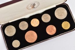 A 1962 ELIZABETH II SPECIMEN COIN SET, containing a full gold Sovereign coin dated 1962 with Half-