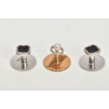 THREE DRESS STUDS, a pair of white metal dress studs with a square black enamel design, stamped 9ct,