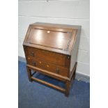 AN OAK FALL FRONT BUREAU, with two drawers, width 77cm x depth 44cm x height 100cm
