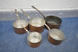 A MATCHED SET OF FIVE COPPER GRADUATING PANS