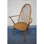 AN ERCOL ELM AND BEECH WINDSOR QUAKER BACK ARMCHAIR