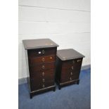 A TALL STAG MINSTREL DRESSING CHEST, the hinged top enclosing a dressing area with a mirror, above