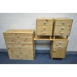A PINE FOUR PIECE BEDROOM SUITE, comprising a chest of five drawers, dressing table and a pair of