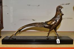 A REPRODUCTION ART DECO STYLE BRONZED FIGURE OF AN EXOTIC PHEASANT ON A BLACK MARBLE BASE, the