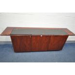 A ROSEWOOD EFFECT DANISH/SWEDISH STYLE SIDEBOARD, with an overhanging top, smoker glass insert,