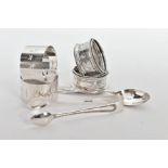 FOUR SILVER NAPKIN RINGS, A PAIR OF SUGAR TONGS AND A TEASPOON, two napkin rings engraved with