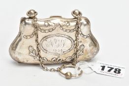 AN EARLY 20TH CENTURY SILVER PURSE, AF purse of a wavy form, the centre engraved with the