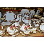 A SIXTY ONE PIECE ROYAL ALBERT OLD COUNTRY ROSES TEA SET, comprising a coffee pot, a teapot (chip