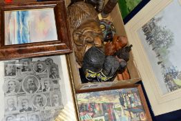 A BOX OF WOODEN TRIBAL BUSTS AND WALL MASKS AND ELEVEN FRAMED PICTURES, including two treen busts