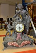 A SPELTER AND VARIGATED MARBLE DRUM HEAD MANTLE CLOCK, the Uranium glass dial having Arabic