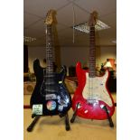 TWO STRAT TYPE ELECTRIC GUITARS comprising of a Chord in black on black with rosewood fingerboard on