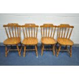 A SET OF FOUR PINE DINING CHAIRS