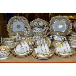 A THIRTY NINE PIECE NINETEENTH CENTURY COALPORT TEA SET, in white, pale apricot and gold, with a