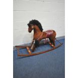 A BOW ROCKING HORSE (condition:-base dismantled, and loose parts)
