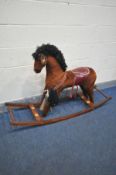 A BOW ROCKING HORSE (condition:-base dismantled, and loose parts)