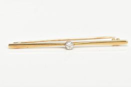 AN EARLY 20TH CENTURY 15CT GOLD DIAMOND BAR BROOCH, the central old cut diamond within an eight claw