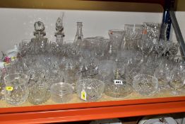 A QUANTITY OF 19TH AND 20TH CENTURY CUT AND MOULDED GLASSWARE, primarily drinking glasses, decanters