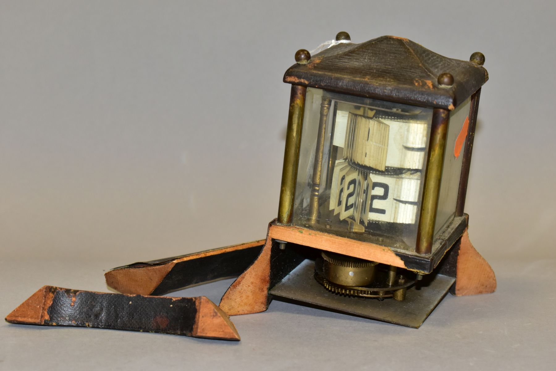 AN EDWARDIAN BRASS AND LEATHER CASED PERPETUAL CALENDAR, in an architectural case, lacks finial, the - Image 3 of 8