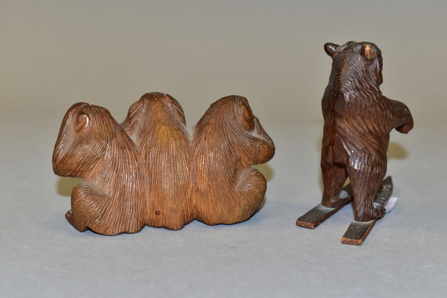 AN EARLY 20TH CENTURY CARVED TREEN BLACK FOREST BEAR ON SKIS, height 6.5cm, s.d., a Japanese - Image 5 of 11