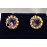 A PAIR OF YELLOW METAL AMETHYST AND SEED PEARL EARRINGS, each of a circular form, centring on a