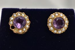 A PAIR OF YELLOW METAL AMETHYST AND SEED PEARL EARRINGS, each of a circular form, centring on a