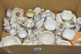 THIRTY SIX PIECES OF CERAMIC CRESTED WARES, pieces by different manufacturers to include WH Goss,