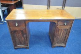 A REGENCY WALNUT AND EBONY STRING INLAID PEDESTAL DESK, with two drawers above panelled cupboard