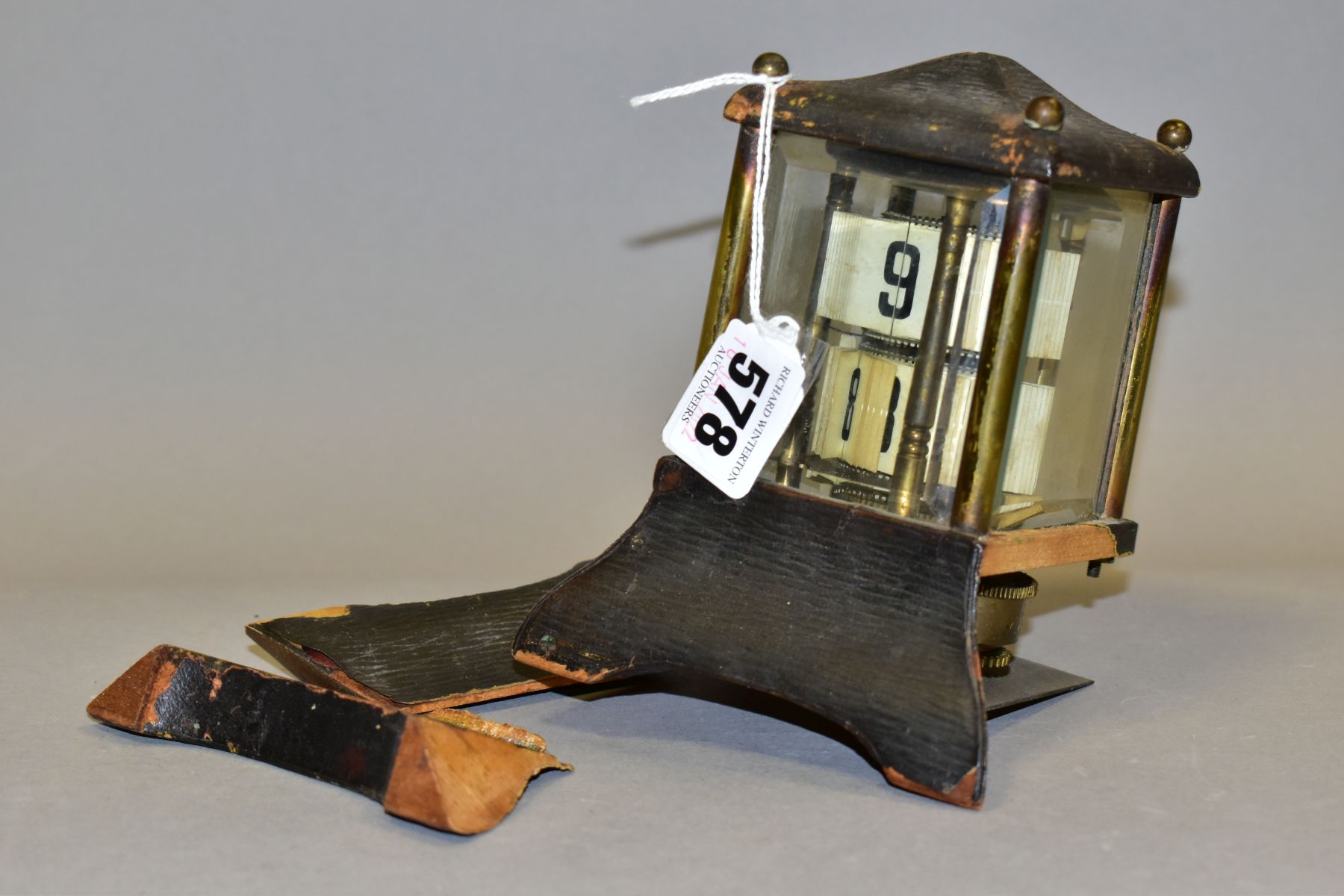AN EDWARDIAN BRASS AND LEATHER CASED PERPETUAL CALENDAR, in an architectural case, lacks finial, the - Image 4 of 8