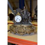 A LATE 19TH CENTURY FRENCH GILT METAL AND BRONZED FIGURAL MANTEL CLOCK, cast as a Cavalier