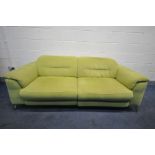 A FURNITURE VILLAGE MISSOURI RANGE LIME GREEN ELECTRIC SOFA, with reclining and rising head