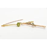 TWO EARLY 20TH CENTURY BAR BROOCHES, one tapered bar brooch set with a single oval cut peridot,