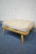 AN ERCOL BLONDE BEECH WINDSOR FOOT STOOL, with a separate cushion (the cushion does not comply