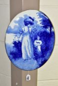 A DOULTON BURSLEM OVAL BLUE AND WHITE PLAQUE, decorated with a scene of a mother and child, gilt