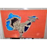 A 1970'S CERAMIC AND ENAMEL GLASS WALL HANGING, said to be depicting a Capercaillie bird, initialled