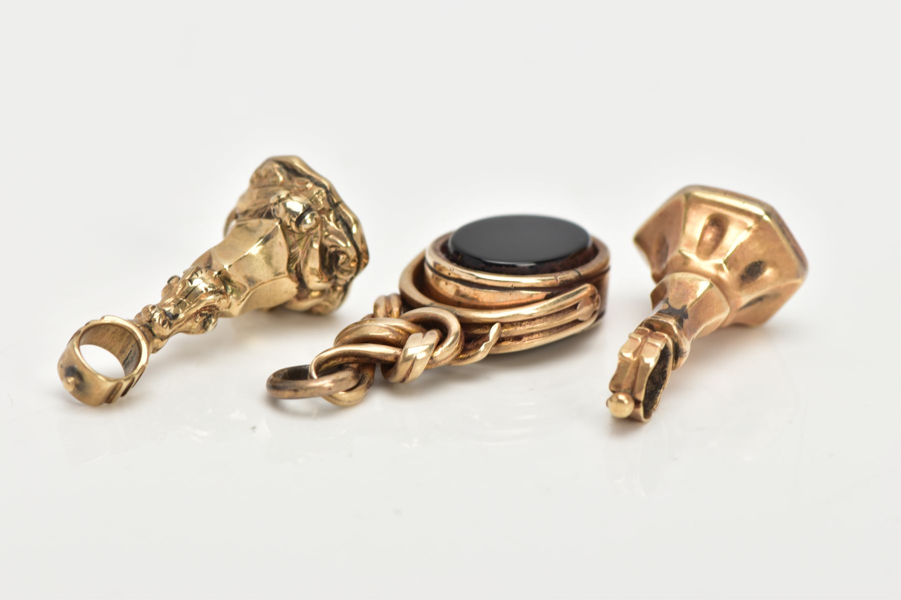 THREE FOBS, the first with oval onyx and banded agate swivel panel, the second with shield shape - Image 3 of 4