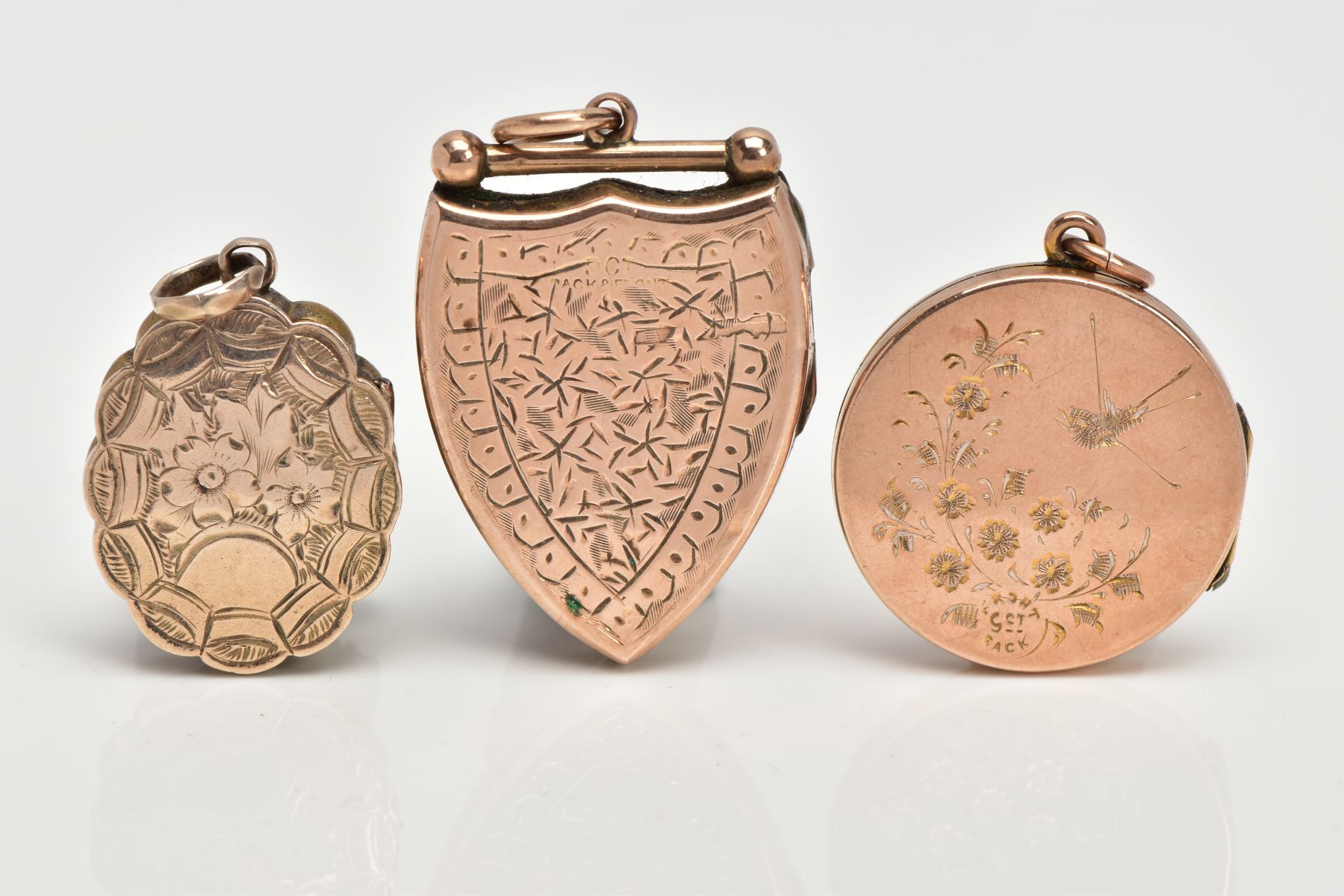 THREE EARLY 20TH CENTURY 9CT FRONT AND BACK LOCKETS, to include a shield shaped locket with embossed - Image 2 of 4