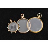 THREE GOLD MOUNTED PHOTOGRAPH PENDANTS, to include one glass pendant with a plain polished mount and