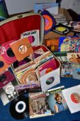 A SUITCASE AND A BOX CONTAINING OVER FIVE HUNDRED AND FIFTY 7 INCH SINGLES AND FIVE LP'S, from the