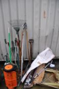 A COLLECTION OF GARDEN TOOLS including spades, tree loppers, an Eckman three piece long reach set (
