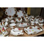 A ROYAL ALBERT OLD COUNTRY ROSES PATTERN DINNER SERVICE, comprising two twin handled circular