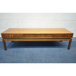 A MID CENTURY GREAVES AND THOMAS AFROMOSIA COFFEE TABLE, with three drawers, unmarked, 150cm x depth