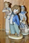 TWO LLADRO DAISA FIGURES AND A NAO FIGURE, comprising Winter, No.5220, sculpted by Juan Huerta,