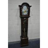 A MODERN MAHOGANY LONGCASE CLOCK, the arched glazed hood enclosing an eight inch dial, tempus