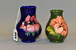 TWO MOORCROFT POTTERY VASES, comprising a globe shaped vase with cylindrical neck decorated with