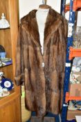 A FOX FUR COAT WITH A SYNTHETIC FUR CAPE, coat has a Canadian Fur Co label, approximate size 12-