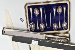 A CASED SET OF SILVER TEASPOONS AND A SILVER HANDLED BREAD KNIFE, the set comprising of six old